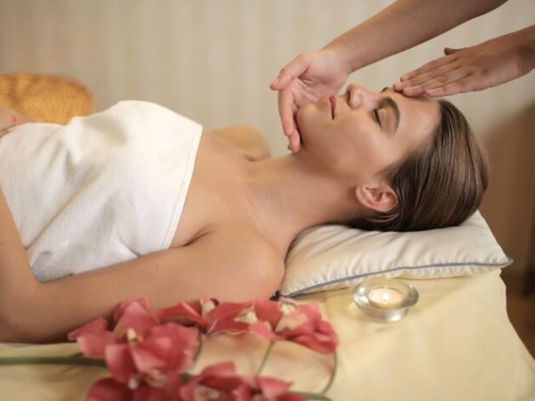 attractive-young-female-getting-massage-spa-salon_181624-33487